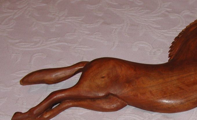 This horse wall carving is in the collection of Rich and Fran Italiano.